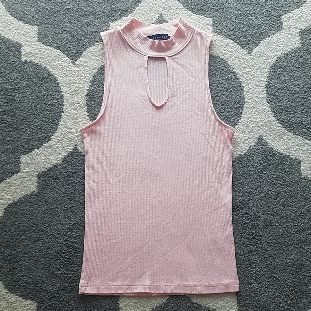 Tight light pink ribbed top